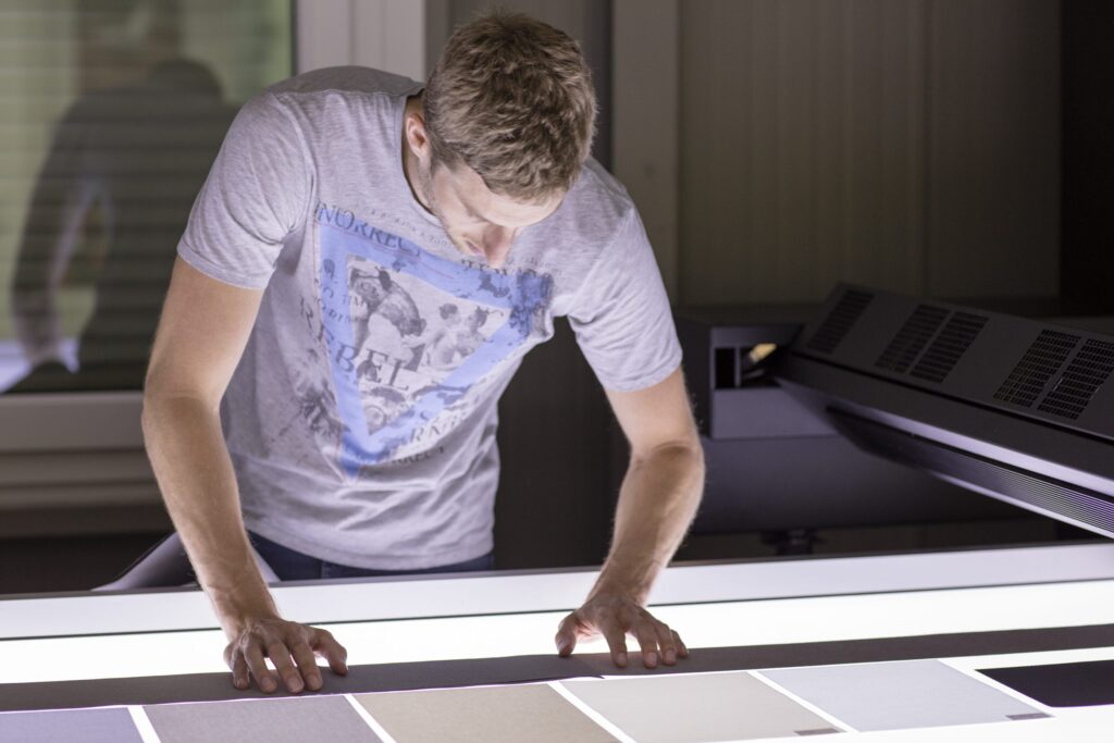 person working on high end scanner table